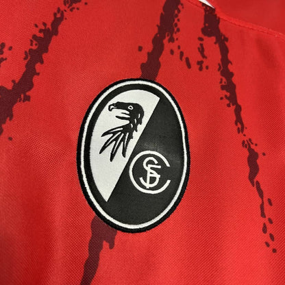 Camiseta Feminina Freiburg 24/25 Primera Equipación